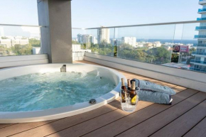 Sun & Serenity + Jacuzzi+SeaView+BBQ+Balcony+Gym